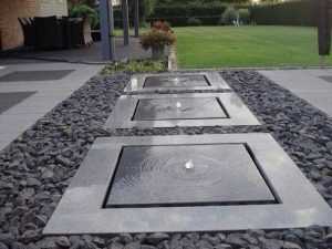 Natuurstenen modern waterornament als tuindecoratie
